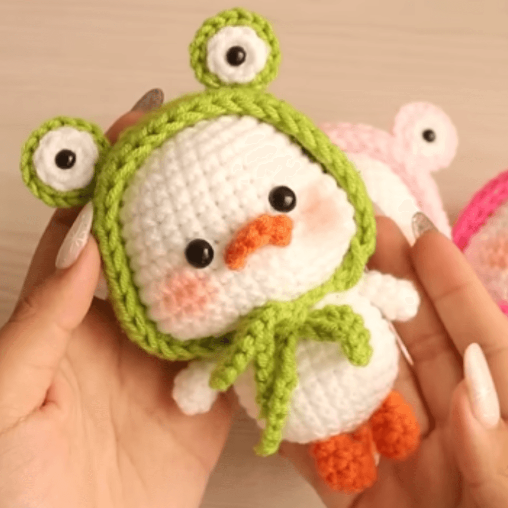 Amigurumi Duckle in a frog suit